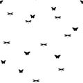 The seamless pattern with black dragonflies and butterflies on a white background. Royalty Free Stock Photo